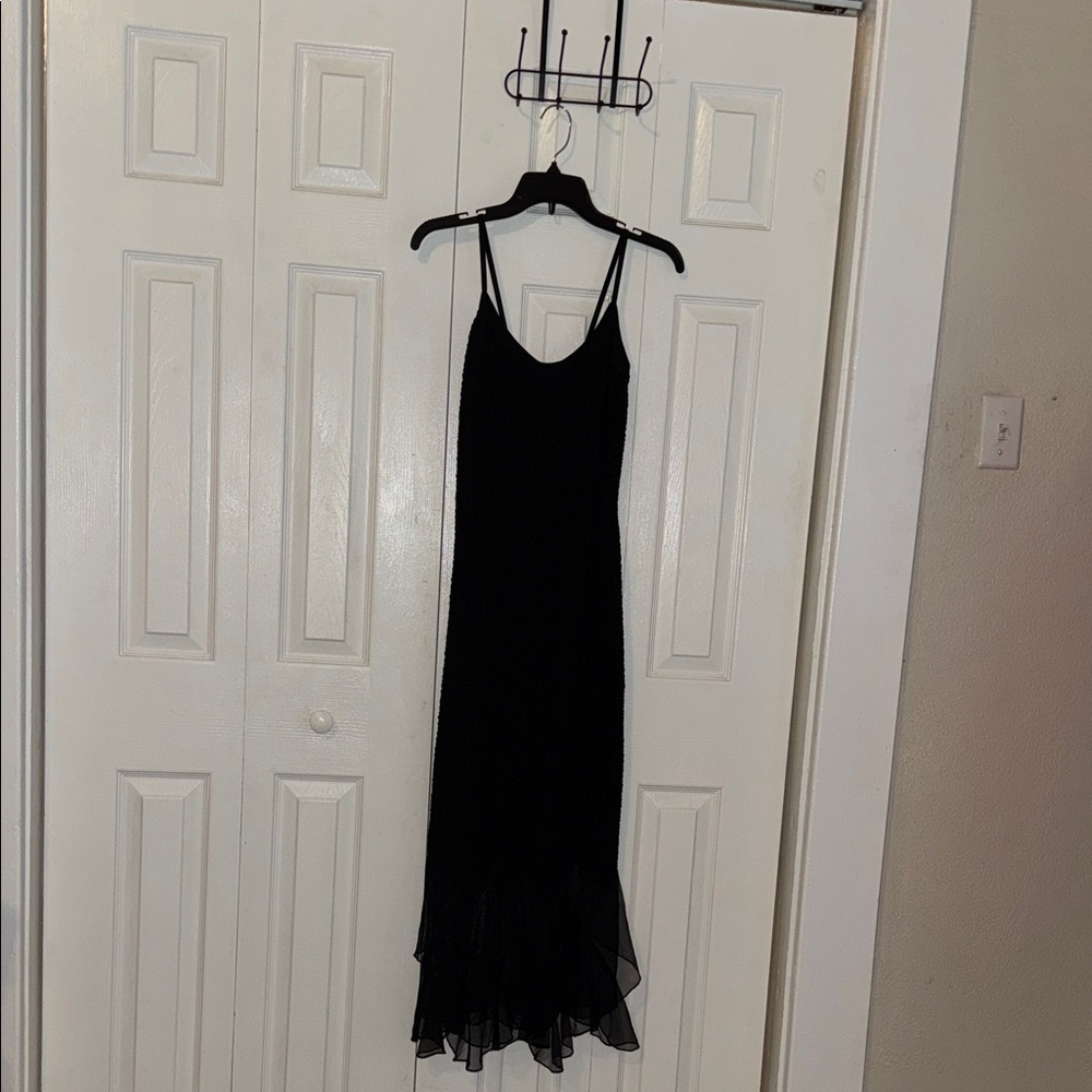 SteppinOut Sleek Black Spaghetti-Strap Maxi Dress with Ruffled Hem